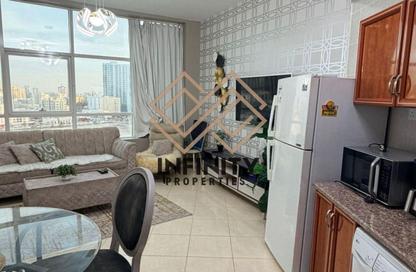 Apartment - 1 Bedroom - 2 Bathrooms for sale in Orient Tower 1 - Orient Towers - Al Bustan - Ajman