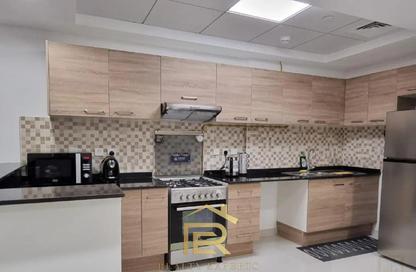 Apartment - 2 Bedrooms - 3 Bathrooms for rent in Spanish Tower - Dubai Sports City - Dubai