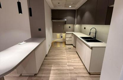 Apartment - 1 Bedroom - 2 Bathrooms for rent in Chaimaa Avenue Residences - District 13 - Jumeirah Village Circle - Dubai