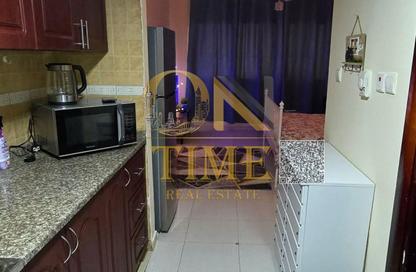 Apartment - Studio - 1 for rent in Corniche Tower - Ajman Corniche Road - Ajman
