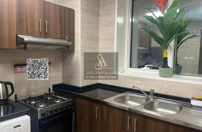 Apartment - 2 - 2 for sale in Oasis Tower 1 - Oasis Tower - Al Rashidiya 1 - Al Rashidiya - Ajman