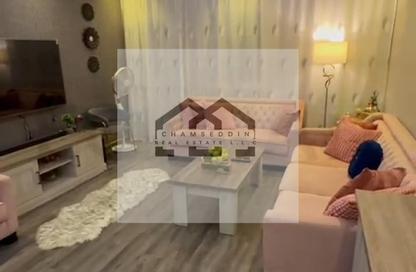 Apartment - 2 Bedrooms - 2 Bathrooms for sale in Orient Tower 1 - Orient Towers - Al Bustan - Ajman