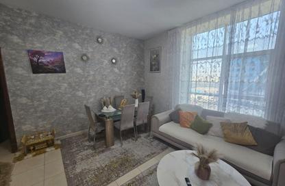 Apartment - 1 Bedroom - 2 Bathrooms for sale in Orient Tower 1 - Orient Towers - Al Bustan - Ajman