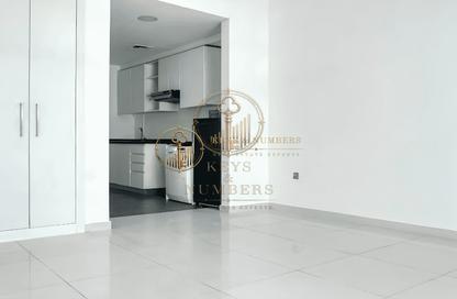 Apartment - Studio - 1 for sale in Golf Panorama B - Golf Panorama - Golf Town - Damac Hills - Dubai