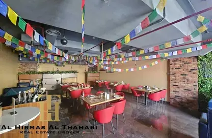 محل - استوديو - 2 حمامات للايجار في برج او2 - منطقة 14 - قرية جميرا الدائرية - دبي