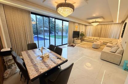 Villa - 4 - 5 for sale in The Strip - District 9 - Al Zorah - Ajman Villa - 4 - 5 for sale in The Strip - District 9 - Al Zorah - Ajman