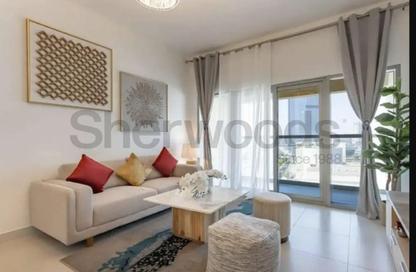 Apartment - 1 Bedroom for rent in Rabdan Building - Motor City - Dubai