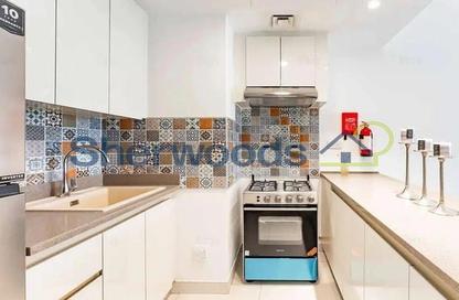 Apartment - 1 Bedroom for rent in Rabdan Building - Motor City - Dubai
