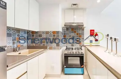 Apartment - 1 Bedroom for rent in Rabdan Building - Motor City - Dubai