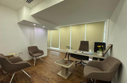 Business Centre - Studio - 2 Bathrooms for rent in Hanging Garden Tower - Al Danah - Abu Dhabi