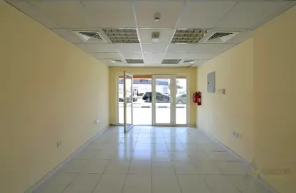Shop - Studio for rent in Building X18 - England Cluster - International City - Dubai