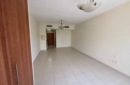 Apartment - Studio - 1 Bathroom for rent in Cricket Tower - Dubai Sports City - Dubai
