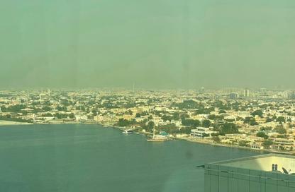 شقة - غرفة نوم - 2 حمامات للايجار في أورينت تاور 1 - أورينت تاور - البستان - عجمان