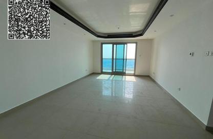 Apartment - 1 Bedroom - 2 Bathrooms for sale in Corniche Tower - Ajman Corniche Road - Ajman