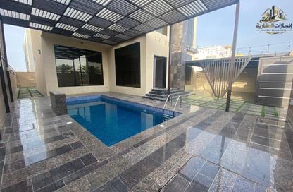 Villa - 5 Bedrooms - 7 Bathrooms for rent in Ajman Hills - Al Alia - Ajman