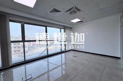 Office Space - Studio - 1 Bathroom for rent in Indigo Optima - Indigo Towers - International City - Dubai