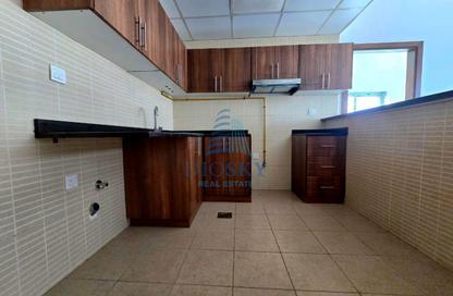 Apartment - 1 Bedroom - 2 Bathrooms for rent in Remal Tower - District 13 - Jumeirah Village Circle - Dubai
