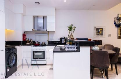 Apartment - 1 - 2 for sale in Golf Promenade 2A - Golf Promenade 2 - Golf Town - Damac Hills - Dubai