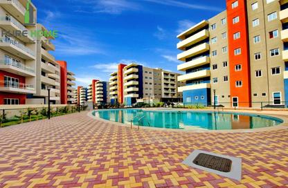 Apartment - 3 - 4 for sale in Tower 1 - Al Reef Downtown - Al Reef - Abu Dhabi Apartment - 3 - 4 for sale in Tower 1 - Al Reef Downtown - Al Reef - Abu Dhabi