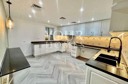 Townhouse - 4 Bedrooms - 5 Bathrooms for sale in Yellow Townhouses - District 12 - Jumeirah Village Circle - Dubai