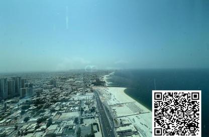 Apartment - 1 Bedroom - 2 Bathrooms for sale in Corniche Tower - Ajman Corniche Road - Ajman