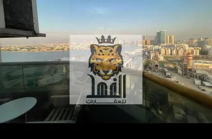 شقة - غرفة نوم - 2 حمامات للبيع في أورينت تاور 1 - أورينت تاور - البستان - عجمان