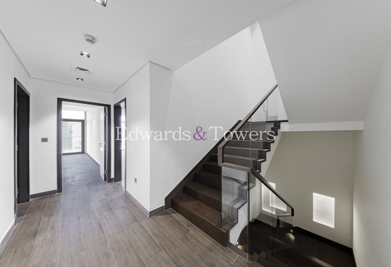 Triplex Penthouse | Full Canal View | Unfurnished photo 13