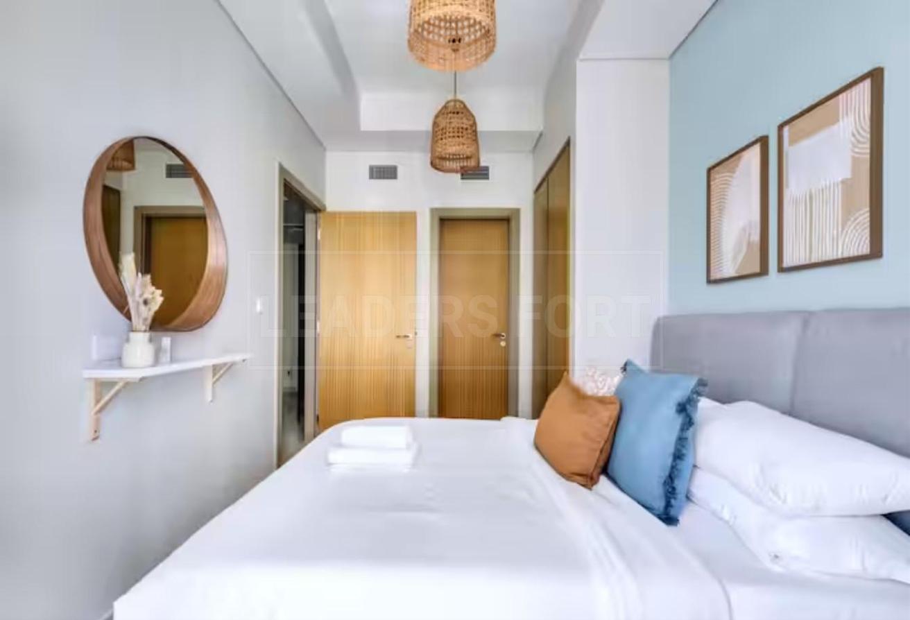 Elegant 2BR | City & Pool View | Ready to Move In photo 5