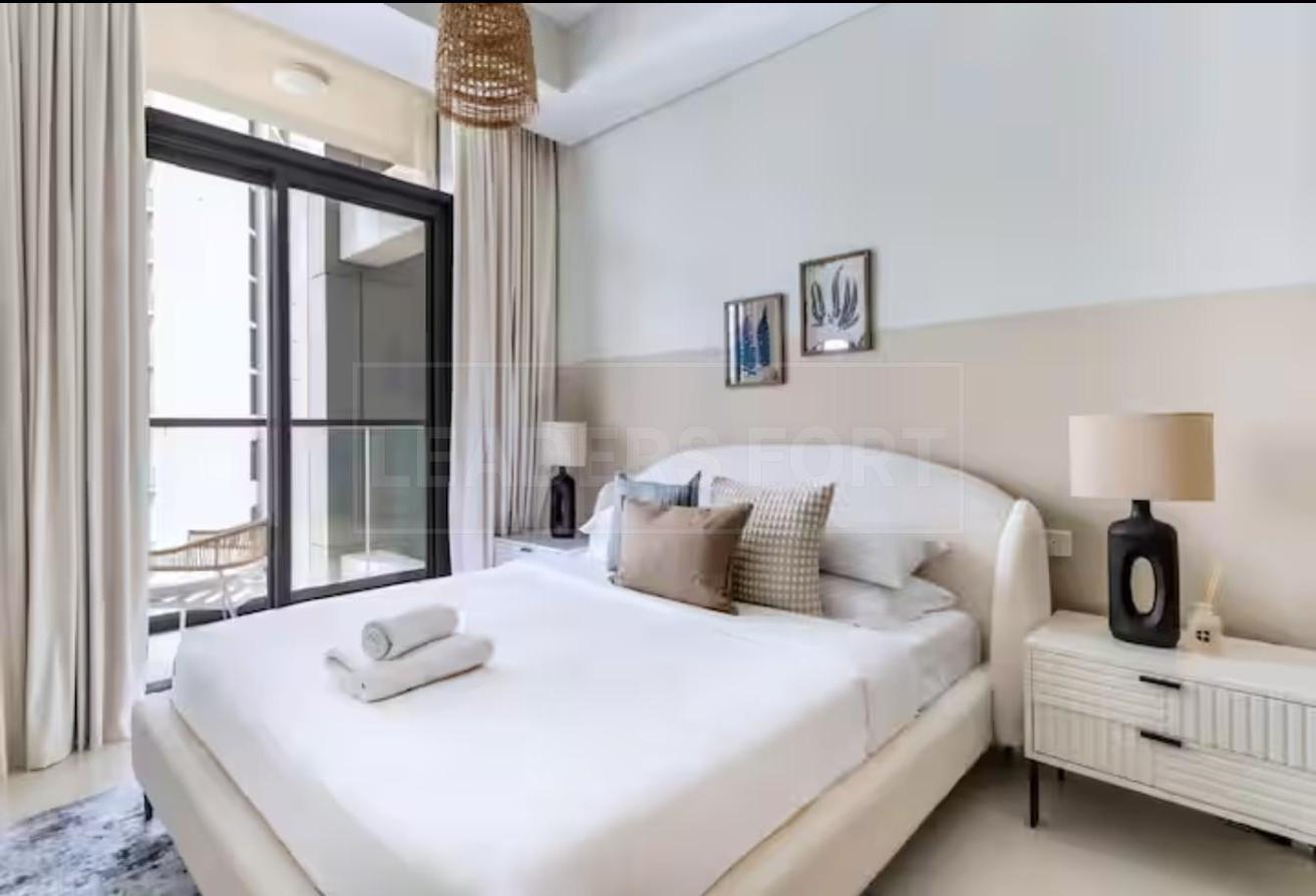 Elegant 2BR | City & Pool View | Ready to Move In photo 4
