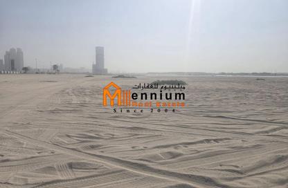 أرض - استوديو للبيع في برج الممزر - شارع التعاون - التعاون - الشارقة