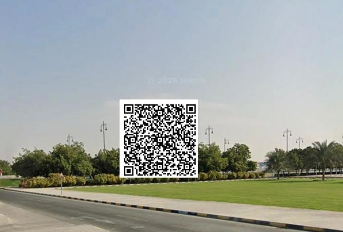قطعة ارض في الرفاع الشارقة .مساحة 10980 قدم.مع تصر