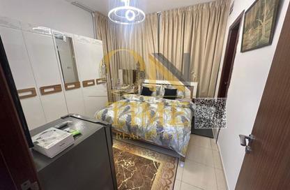 Apartment - 2 Bedrooms - 3 Bathrooms for sale in Orient Tower 1 - Orient Towers - Al Bustan - Ajman