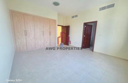Villa - 5 - 7 for rent in Western Residence South - Falcon City of Wonders - Dubai