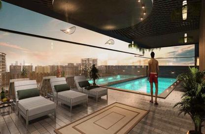 Apartment - 1 Bedroom - 2 Bathrooms for sale in AUM 99 Residences - Dubai Land Residence Complex - Dubai