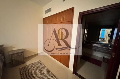 Apartment - 2 Bedrooms - 2 Bathrooms for sale in Corniche Tower - Ajman Corniche Road - Ajman