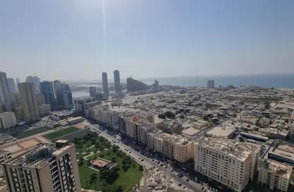 Apartment - 3 Bedrooms - 4 Bathrooms for rent in Thuraya Al Majaz Building - Al Majaz 3 - Al Majaz - Sharjah