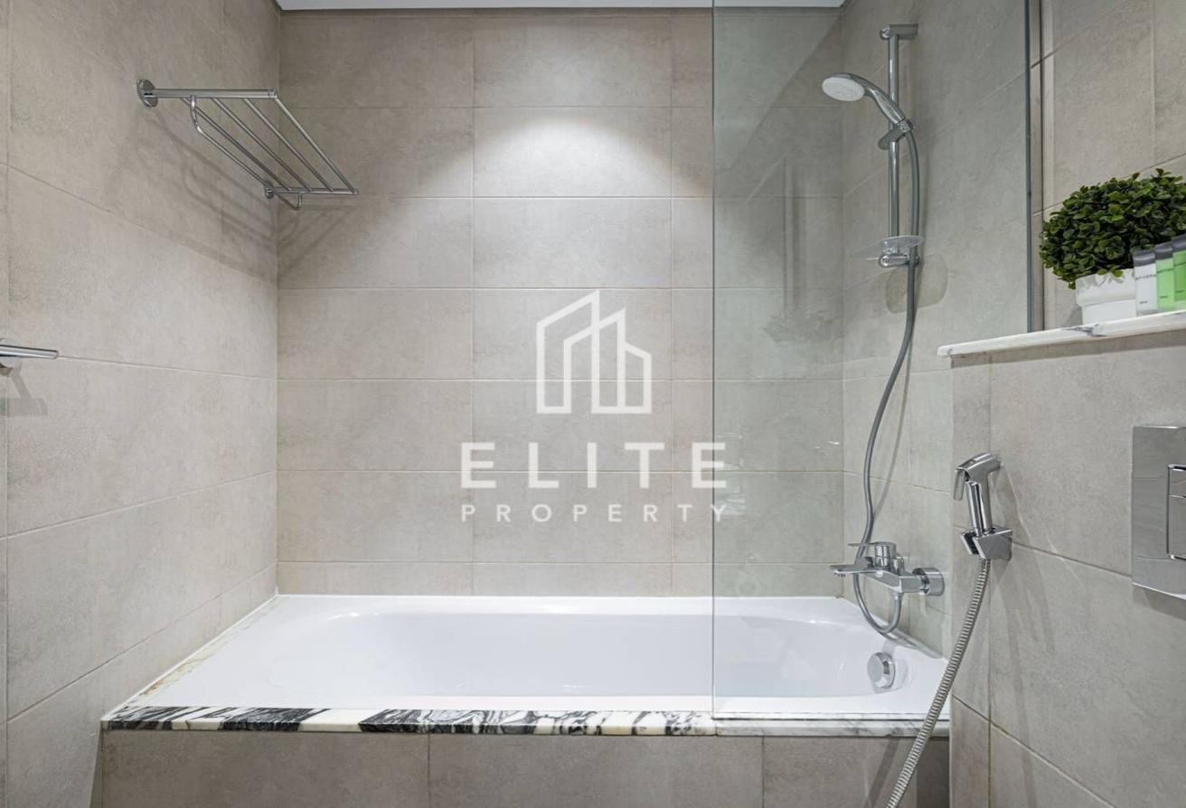 High Floor 2BHK | Infinity Pool and Burj Views photo 24