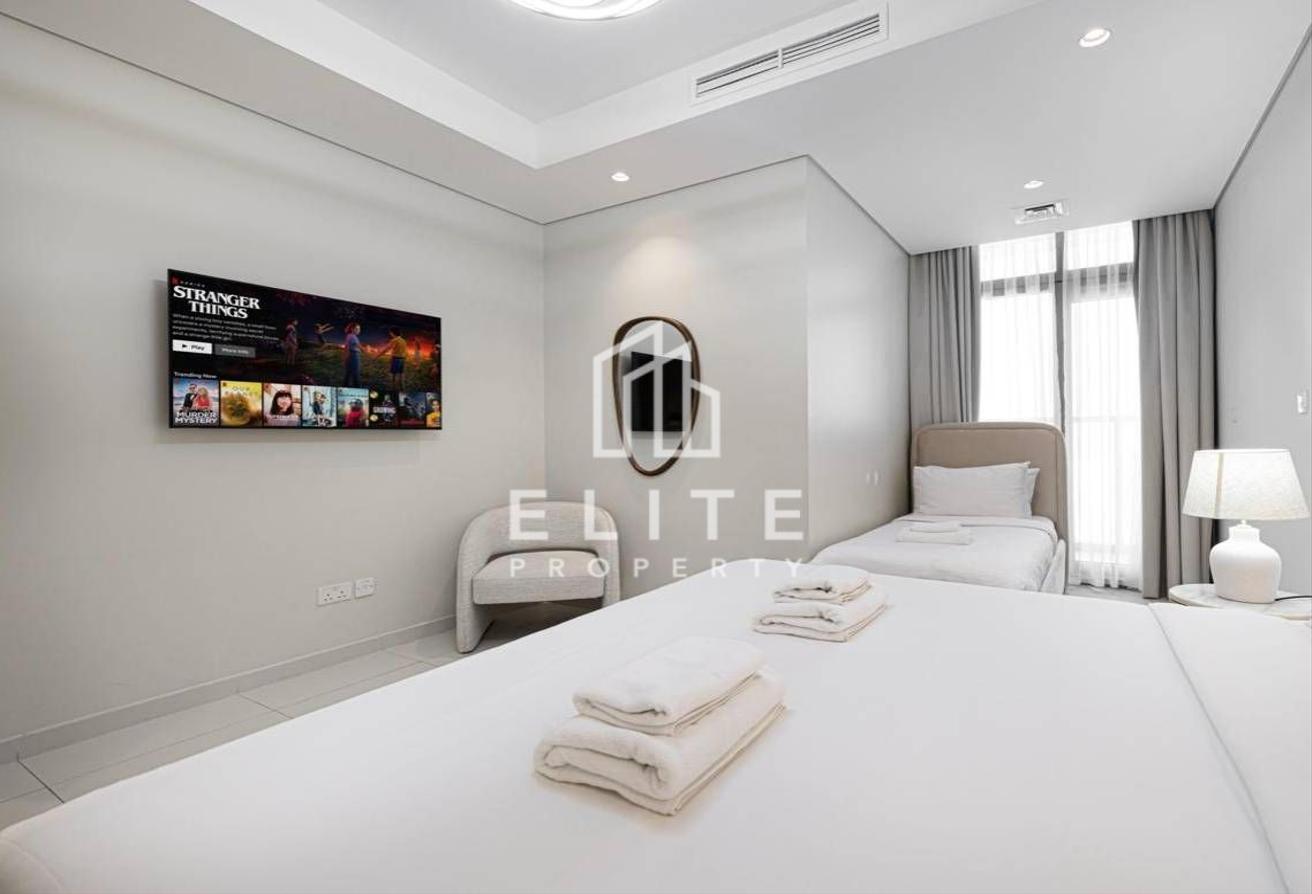 High Floor 2BHK | Infinity Pool and Burj Views photo 5