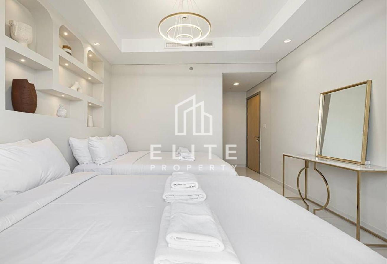 High Floor 2BHK | Infinity Pool and Burj Views photo 9