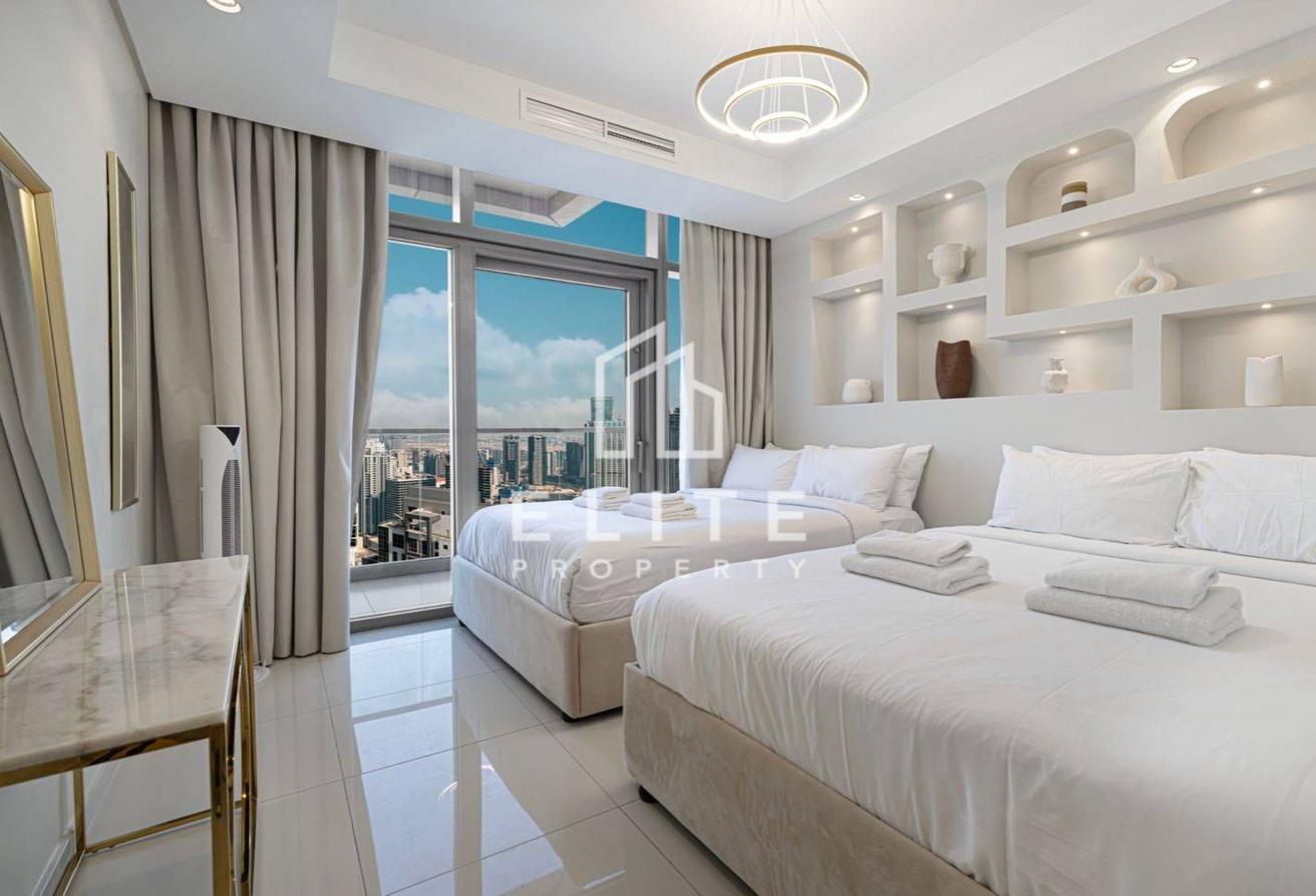 High Floor 2BHK | Infinity Pool and Burj Views photo 6