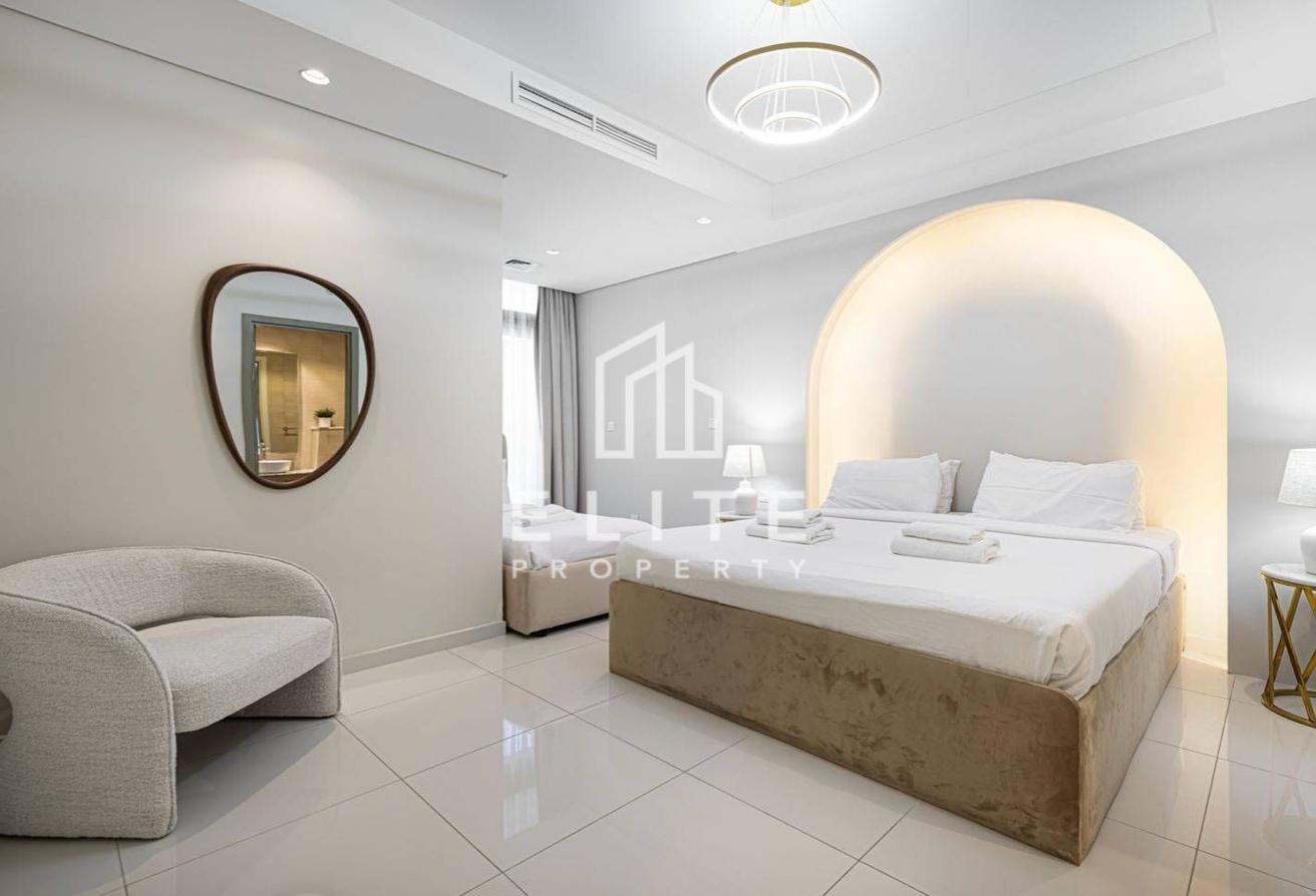 High Floor 2BHK | Infinity Pool and Burj Views photo 12