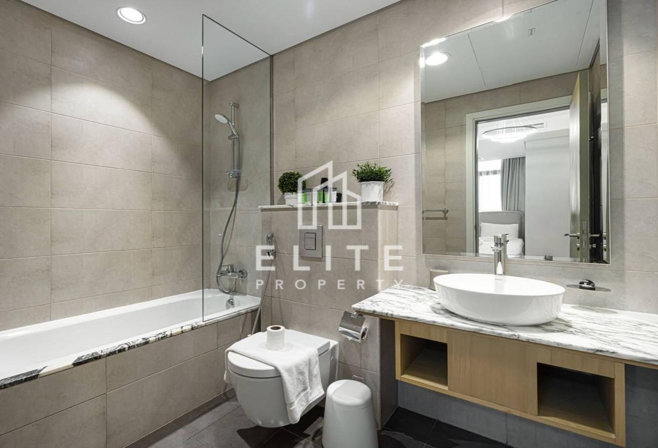High Floor 2BHK | Infinity Pool and Burj Views photo 23