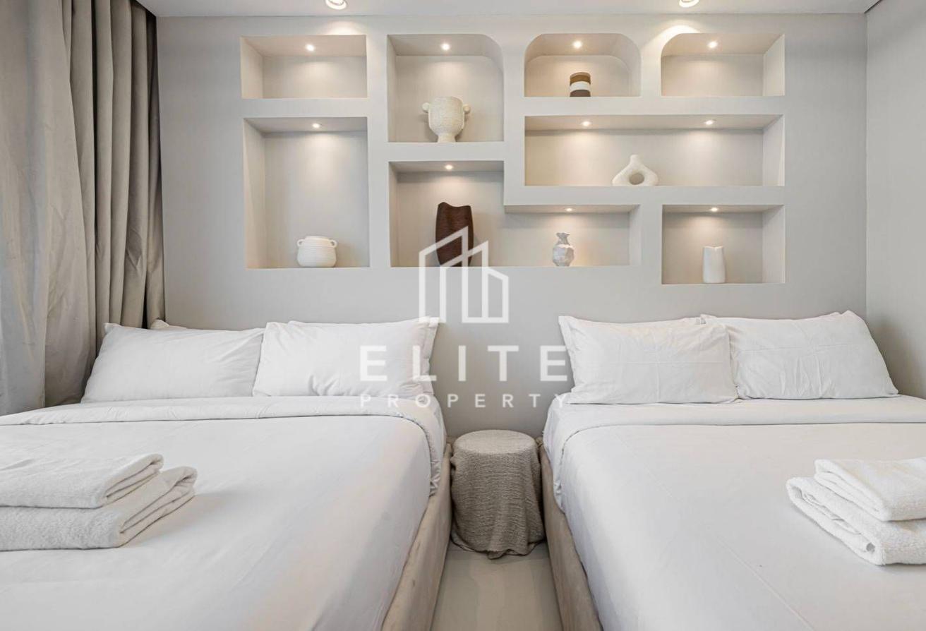 High Floor 2BHK | Infinity Pool and Burj Views photo 20