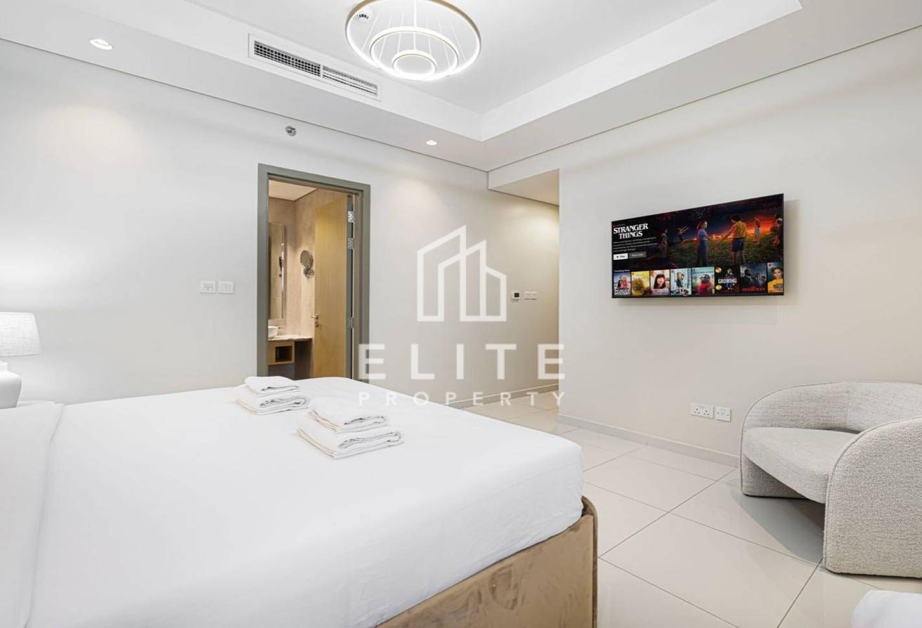 High Floor 2BHK | Infinity Pool and Burj Views photo 16
