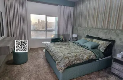 شقة - غرفة نوم - 2 حمامات للبيع في أورينت تاور 1 - أورينت تاور - البستان - عجمان