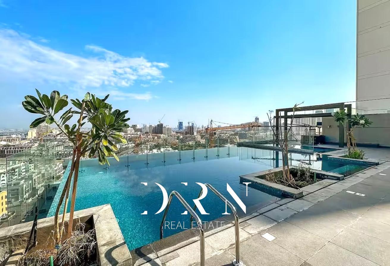 Furnished 1BR Apartment | Balcony & Pool Access photo 23