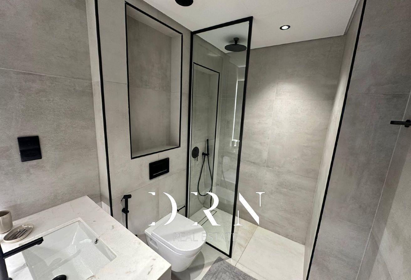 Furnished 1BR Apartment | Balcony & Pool Access photo 14