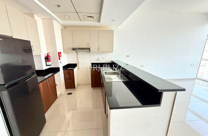 Apartment - Studio - 1 for rent in Reef Residence - District 13 - Jumeirah Village Circle - Dubai