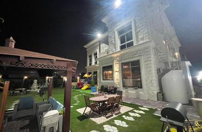 Villa - 5 Bedrooms - 7 Bathrooms for sale in Sharqan - Al Heerah - Sharjah