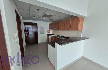 Apartment - Studio - 1 Bathroom for rent in Cricket Tower - Dubai Sports City - Dubai